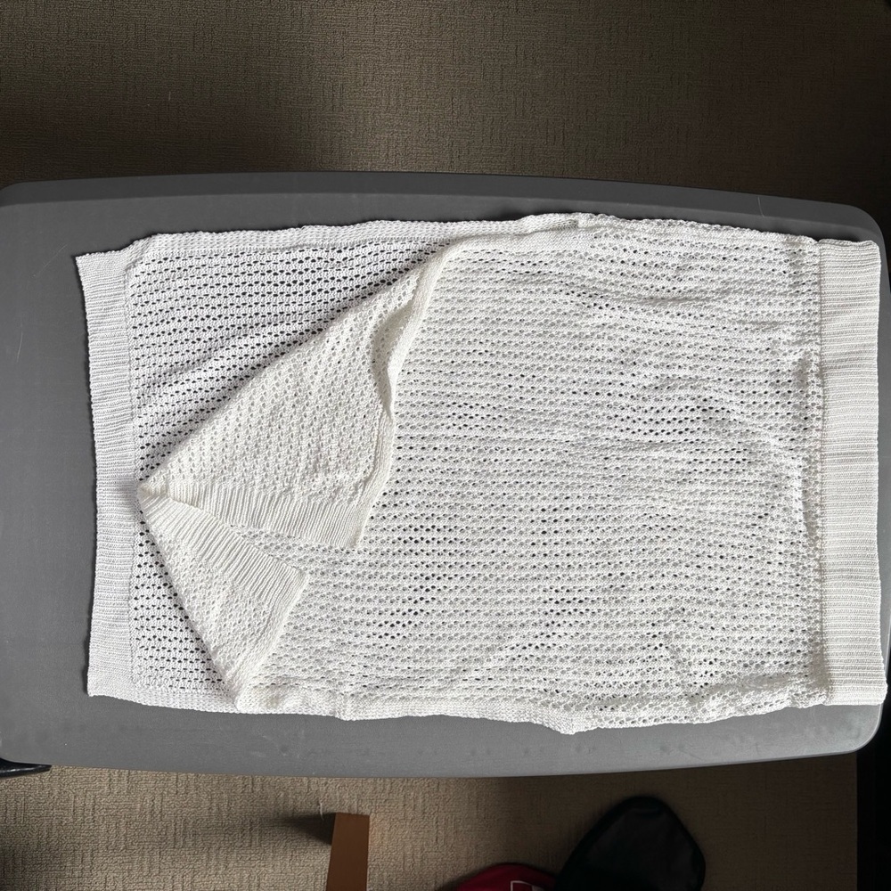 Women’s white knit skirt and crop top set